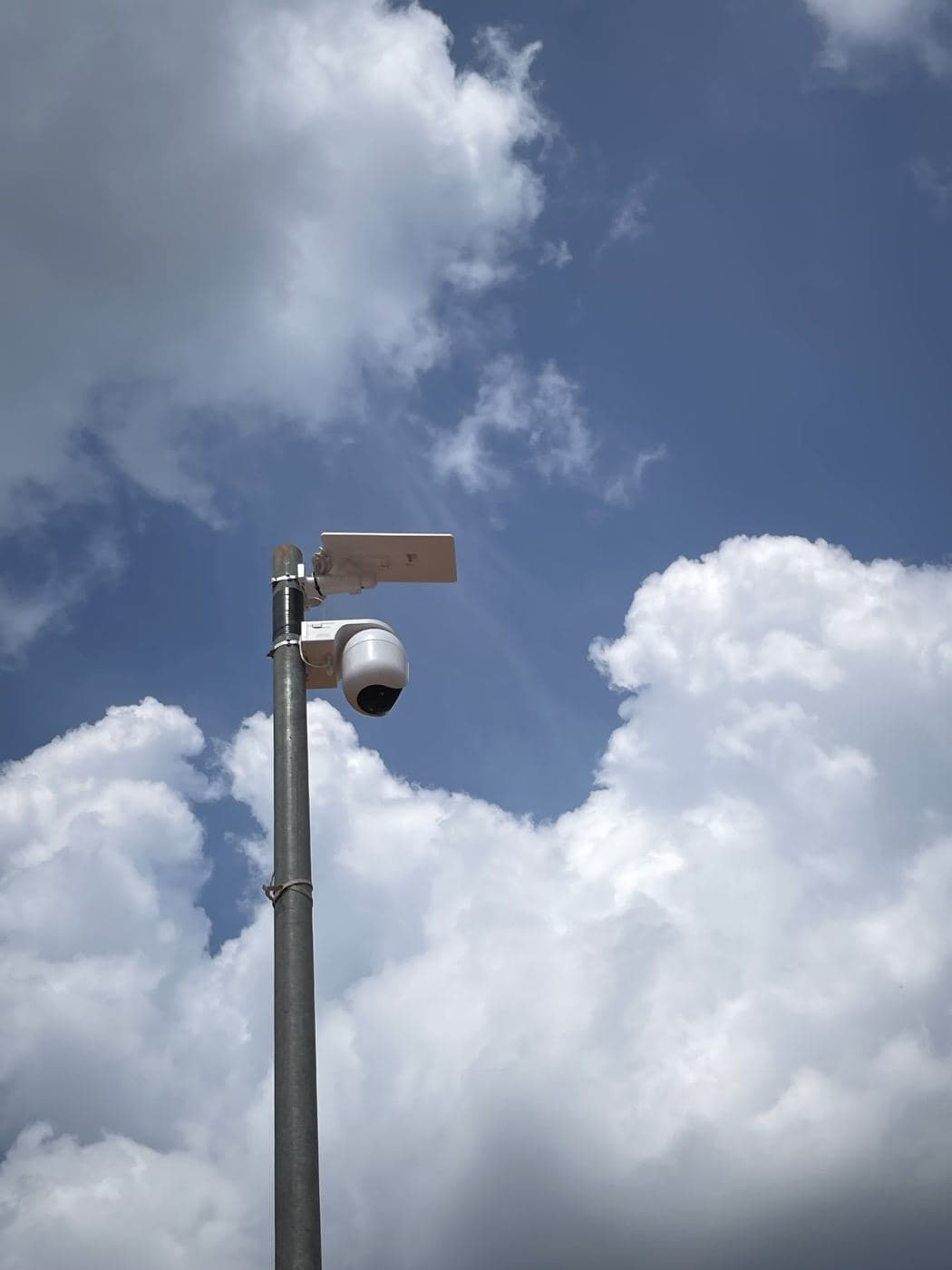 JVA solar CCTV camera and solar panel mounted on a pole